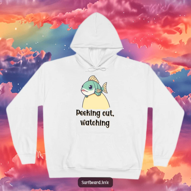 Funny fish peering curiously over a surfboard edge, depicted on a warm and cozy hoodie.